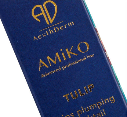 Close-up of a blue cosmetic package with gold lettering reading AesthDerm, AMiKO, and TULIP on a white background.