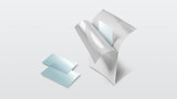 Two small rectangular sheets, one pale blue and one white, with a larger crumpled white sheet behind them, shown on a light gray background.